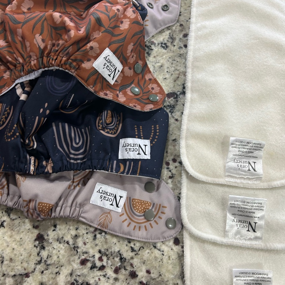 3 diaper cloth with inserts. Nora’s Nursery